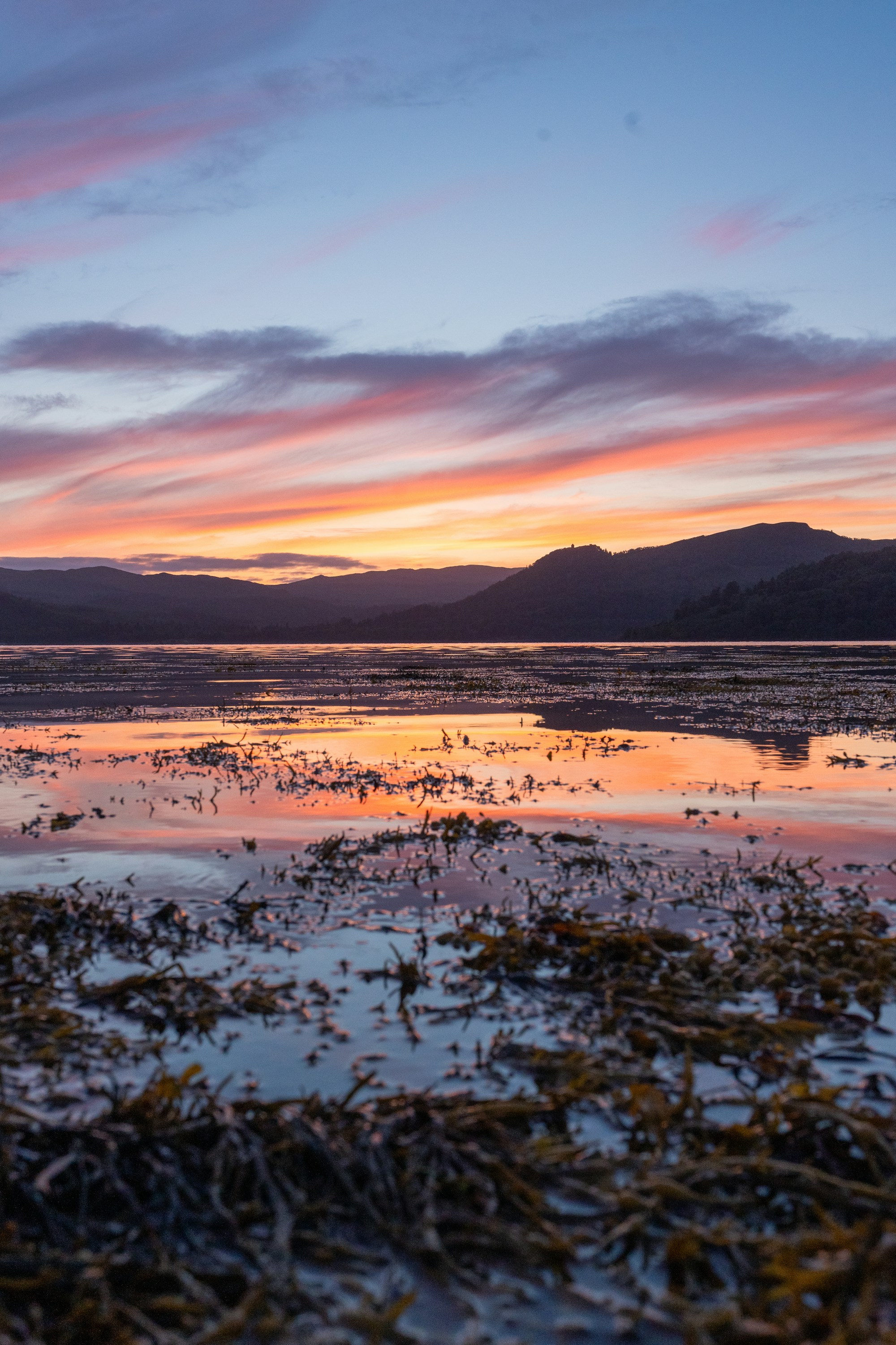 Sunset over the still water of Loch Fyne, Scotland